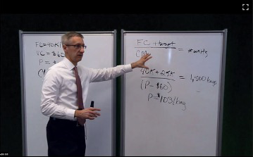Screenshot of presenter standing in front of a whiteboard