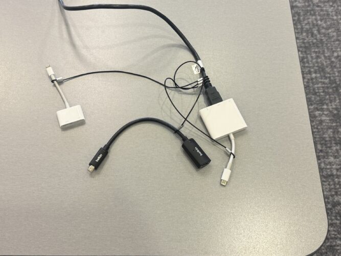 Photo of HDMI adapters at the classroom teaching table